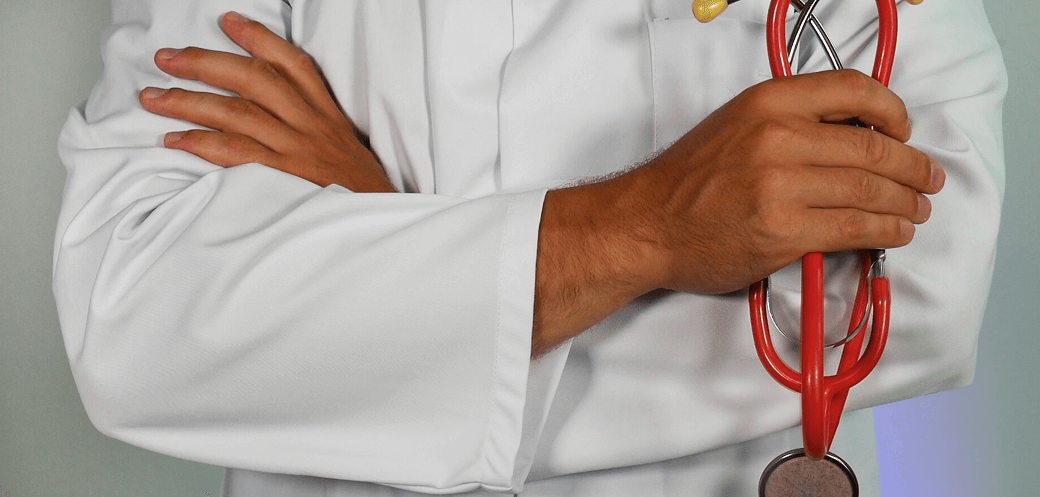 Doctor holding a stethoscope by impulsq