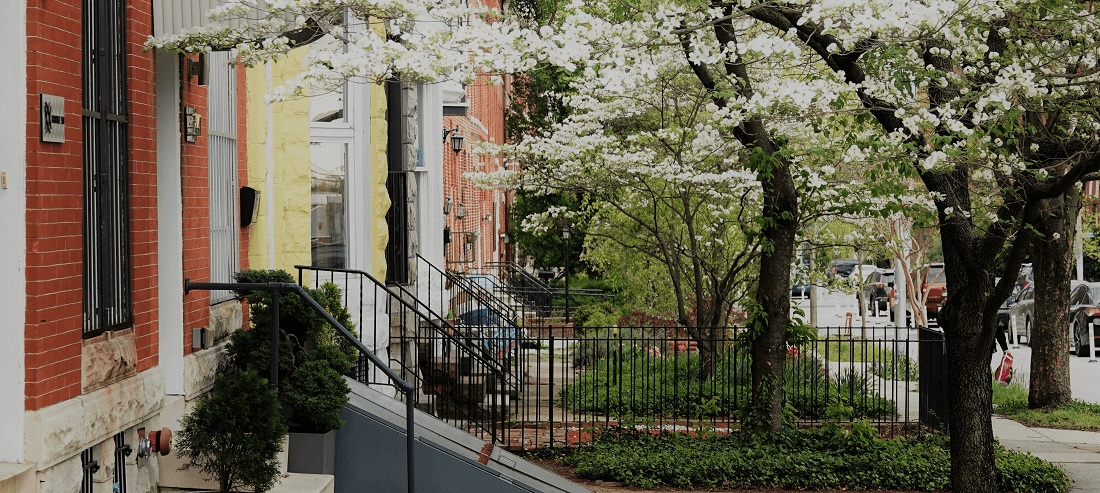 White and concrete rowhouse by Tia Cunningham