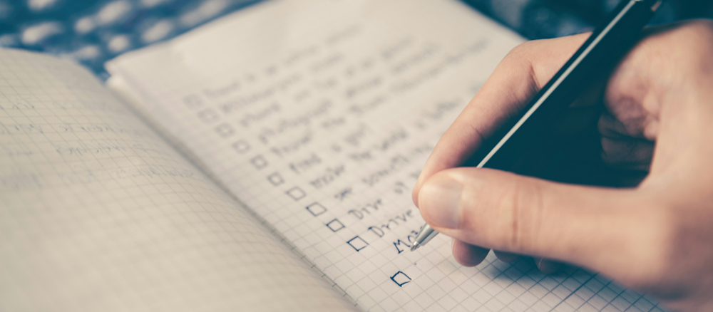 Making a Checklist by Glenn Carstens-Peters on Unsplash