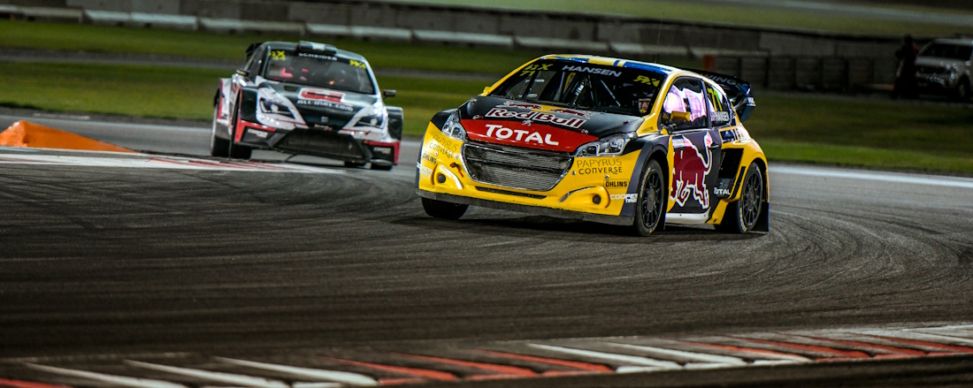 two rally cars racing in Abu Dhabi