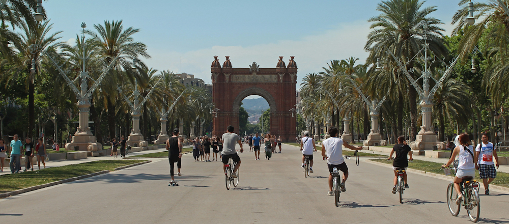 Cyclists and Pedestrians at the Arc de Triomf in Barcelona by J Shim on Unsplash