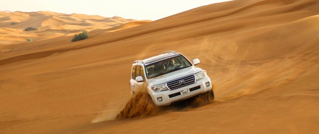 Land Cruiser skidding on dune sand