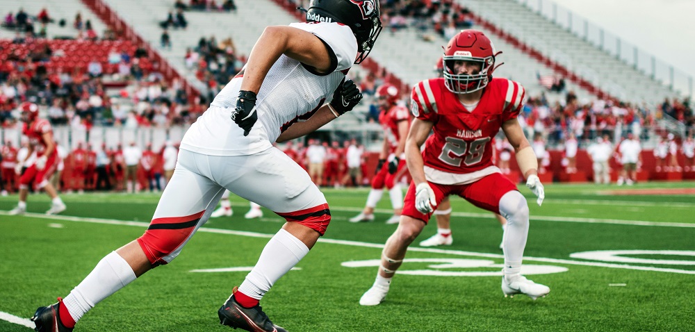 Football game by Tim Mossholder