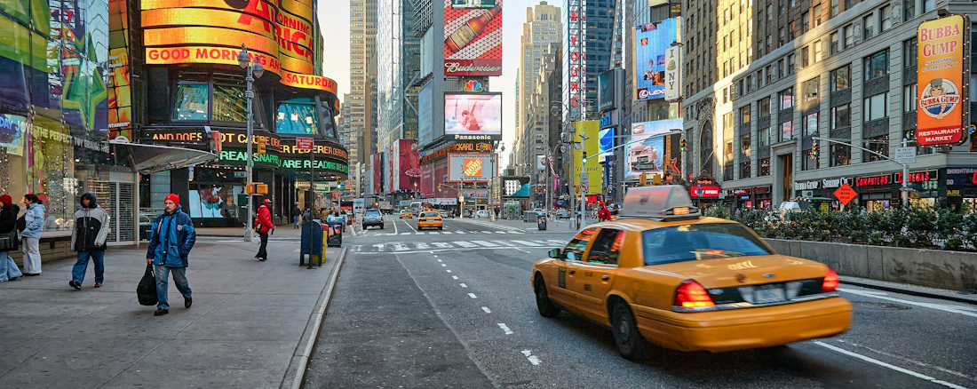 Yellow Cab in Times Square by Vidar Nordli-Mathisen on Unsplash