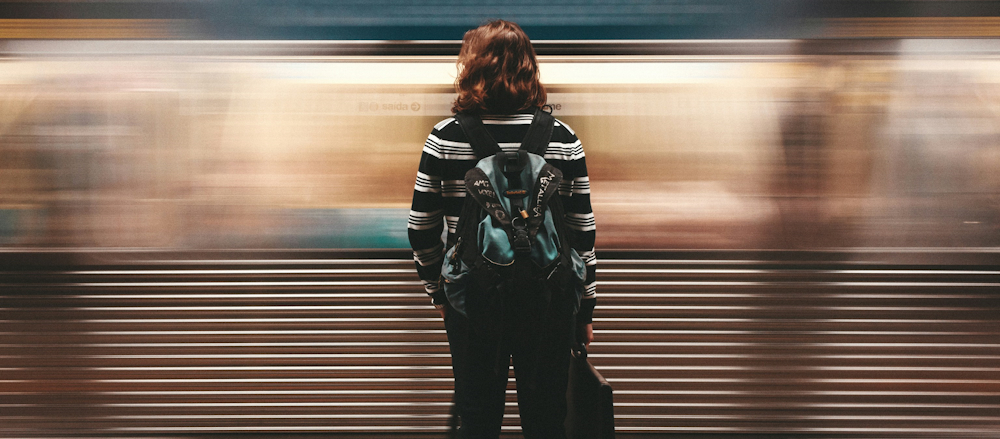 Commuter Waiting for the São Paulo Metro by Denys Argyriou on Unsplash