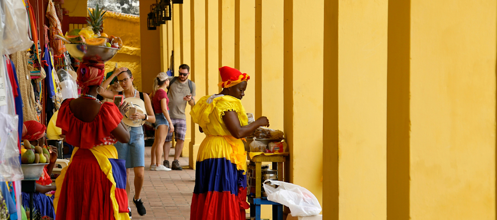 Colombian Women in Traditional Dresses by Ricardo Gomez Angel on Unsplash