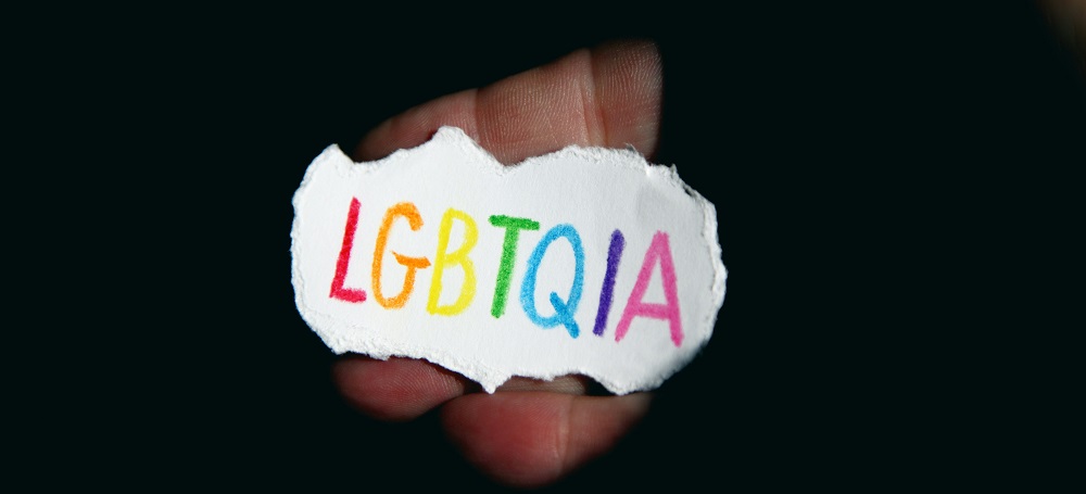 LGBTQIA sign by Alexander Grey
