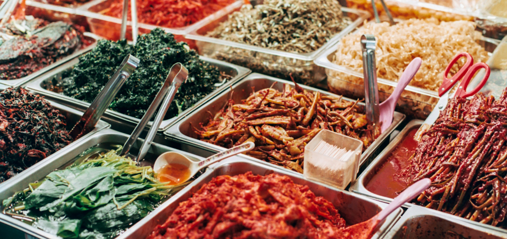 Korean Banchan at a Food Stall by Portuguese Gravity on Unsplash