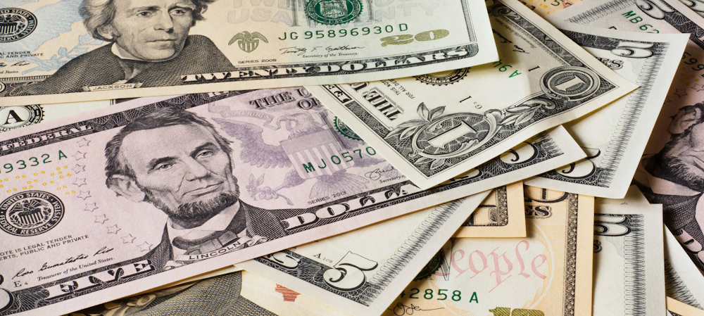 Assorted US Dollar Bills by Alexander Schimmeck on Unsplash