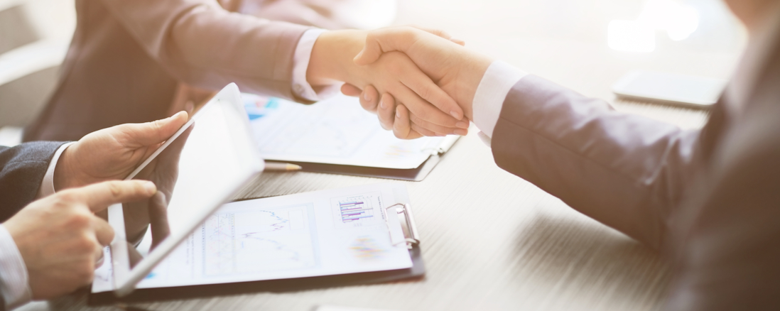 Business people shaking hands stock image