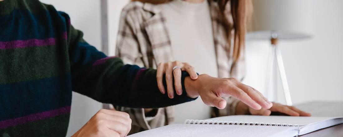 Student learning Braille by Eren Li from Pexels