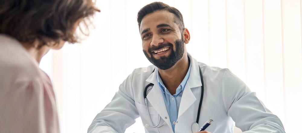 Doctor assisting patient