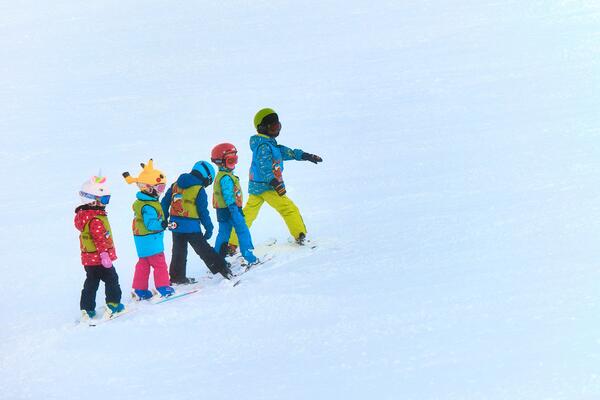 Children skiing by Maxwell Ingham from Unsplash
