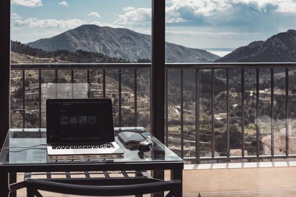 Laptop on desk with a view