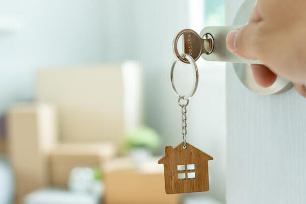 opening a door into a new home